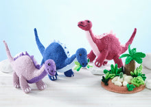 Load image into Gallery viewer, King Cole Dinosaur Land Knitting Book 1 to make T-Rex, Triceratops &amp; Diplodocus Knitted Toys