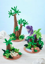 Load image into Gallery viewer, King Cole Dinosaur Land Knitting Book 1 to make T-Rex, Triceratops &amp; Diplodocus Knitted Toys
