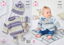 Load image into Gallery viewer, King Cole Aran Knitting Pattern - Baby Jacket Top Hat Socks &amp; Blanket (6045)